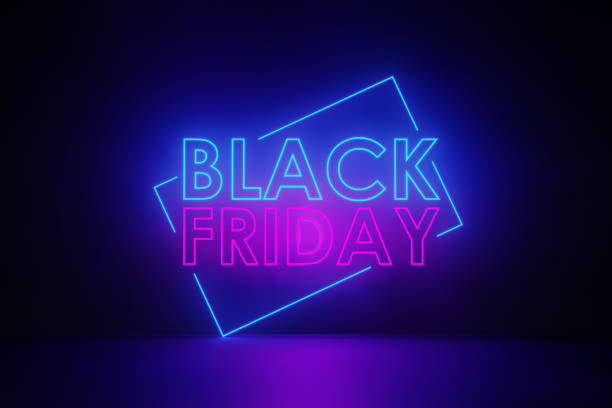 Purple Neon Light Writes Black Friday on Black Wall Purple neon light writes Black Friday on black wall. Horizontal composition with copy space. Black Friday concept. black friday stock pictures, royalty-free photos & images