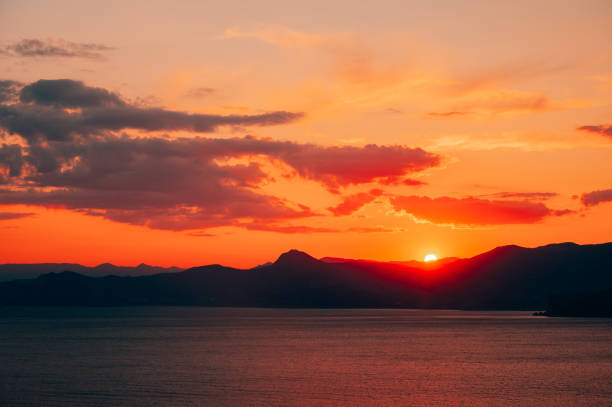istock Beautiful golden sunset on the seaside 1346572069