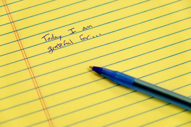 istock Gratitude notebook with pen writing today I am grateful for 1346573255