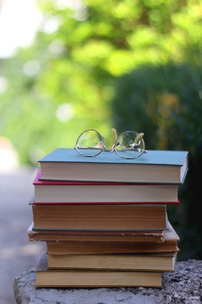 istock Vintage Books and Reading Glasses 1346573665