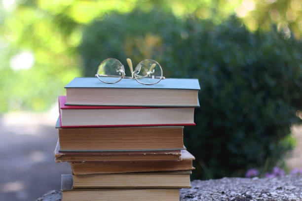 istock Vintage Books and Reading Glasses 1346573668