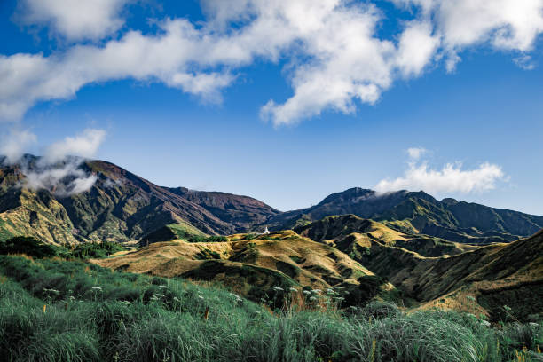 istock Abandoned buddhist temple among mountains near Aso volcano 1346578555