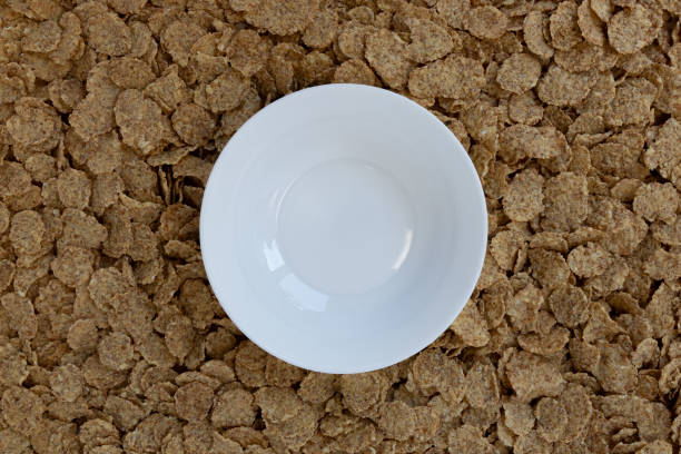 istock empty bowl on cereals background, healthy breakfast 1346581565