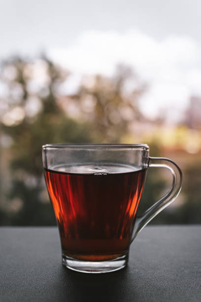 istock A cup of hot tea standing by the window at sunset 1346584753