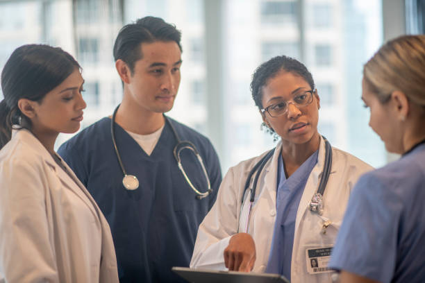 istock Standing Medical Team Meeting 1346586454