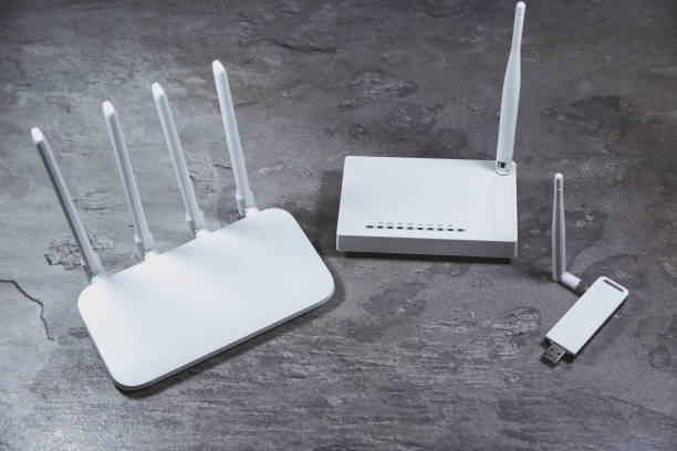istock Three different types of Wi-Fi routers, modern and old technology. Wireless ethernet connection signal. 1346588034