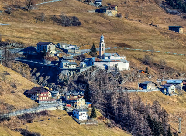 Small mountain village with church in Bormio.