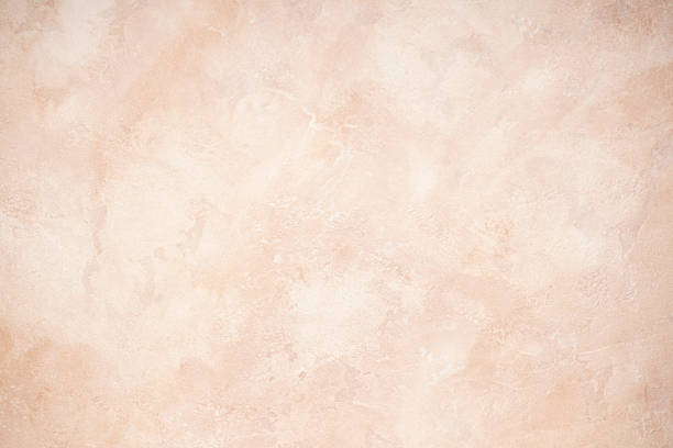 istock Abstract beige textured background. Texture of the wall. 1346592925