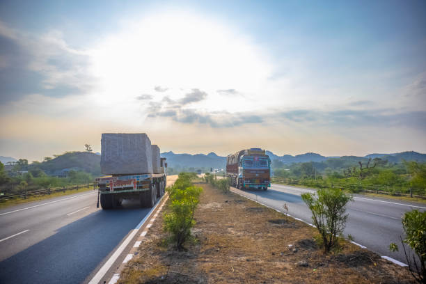 Jaipur, Rajasthan, India - July 2021: Indian national highway, landscape of indian roads on delhi jaipur national highway with vehicles moving on the roads.