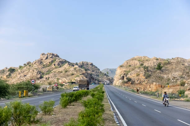 Jaipur, Rajasthan, India - July 2021: Indian national highway, landscape of indian roads on delhi jaipur national highway with vehicles moving on the roads.