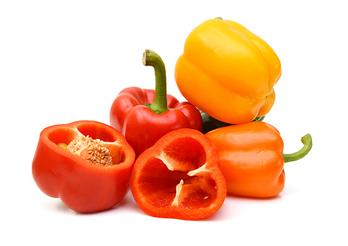 Colorful peppers over white background