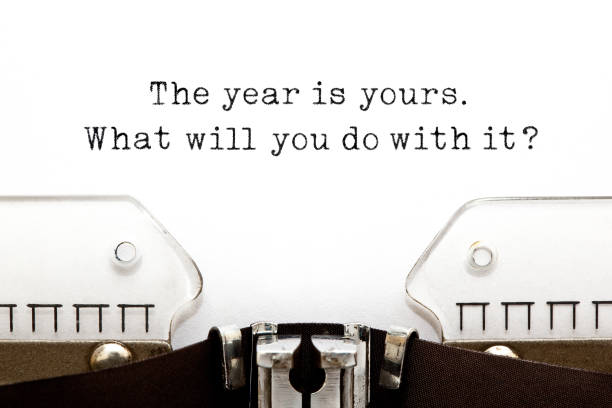 The Year Is Yours What Will You Do With It Inspirational quote The year is yours. What will you do with it? typed on old typewriter. typebar stock pictures, royalty-free photos & images
