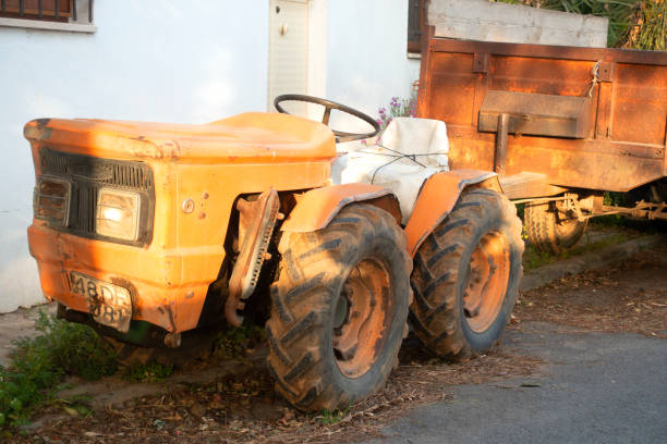 istock Vintage orange tractors 1346611117