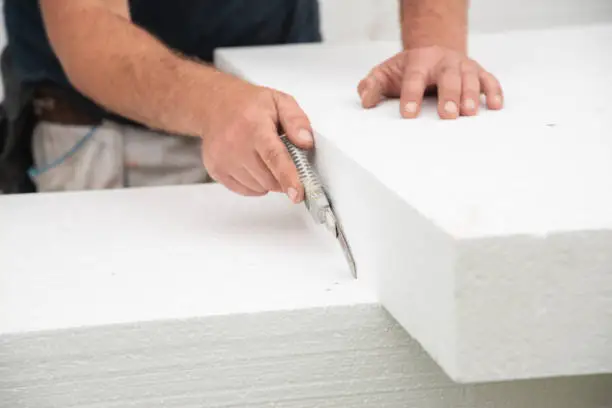 Photo of Cutting styrofoam block with exactoknife