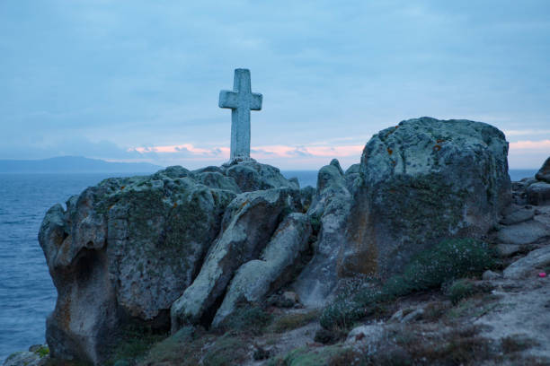 Cross in remembrance for the deceased percebeiros in O Roncudo, Galicia, Spain