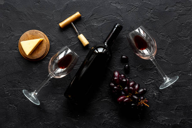 istock Set of wine bottle with glasses corkscrew and grape 1346616481