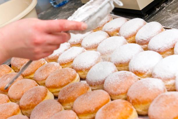 istock Jelly doughnuts are sprinkled with powdered sugar 1346620672