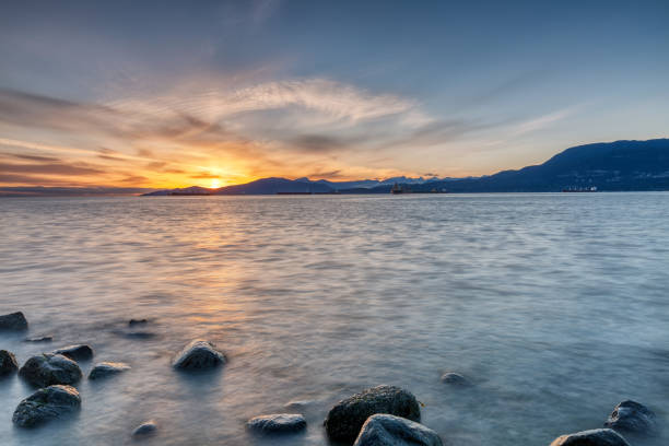 istock beach at sunset glow with long exposure 1346634977