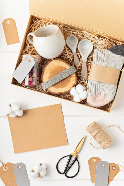 istock Preparing care package, seasonal gift box with plastic free, zero waste products. 1346636804