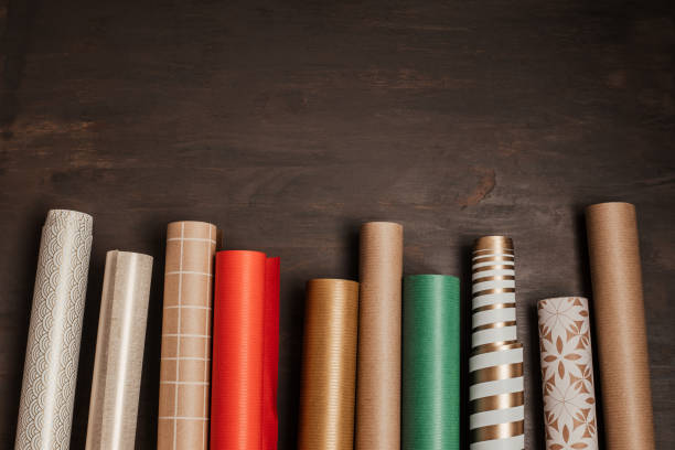 istock Christmas background with rolls of wrapping paper 1346636821