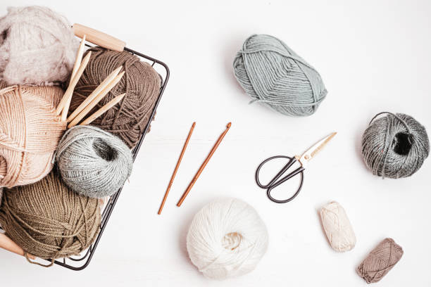 istock Craft hobby background with yarn in natural colors 1346636824