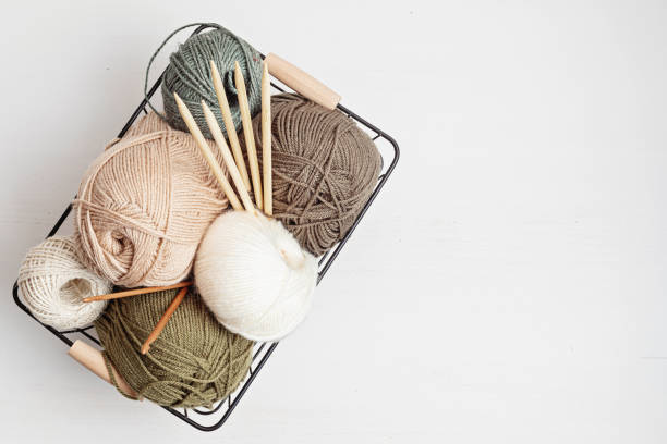 istock Craft hobby background with yarn in natural colors 1346636841