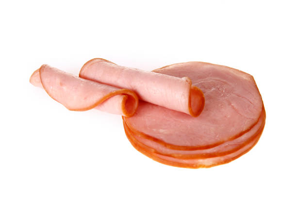 istock Pork ham slices isolated on white background 1346637065