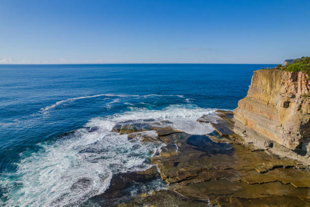 istock Morning seascape flight over The Skillion at Terrigal 1346640577