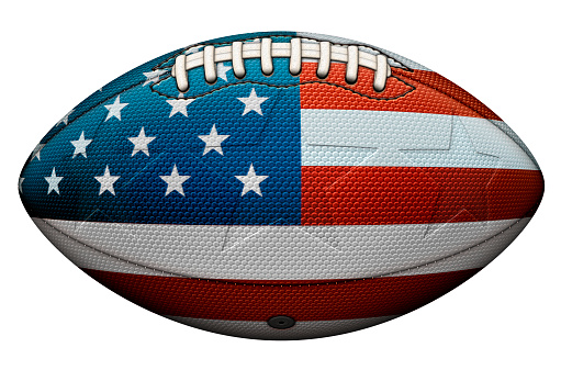 Football ball on a grass field isolated on a white background as a professional or college game sport for traditional American and Canadian play.