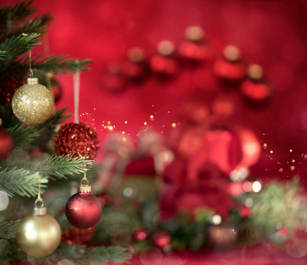 istock Christmas Tree and Gifts on a Red Background 1346648110