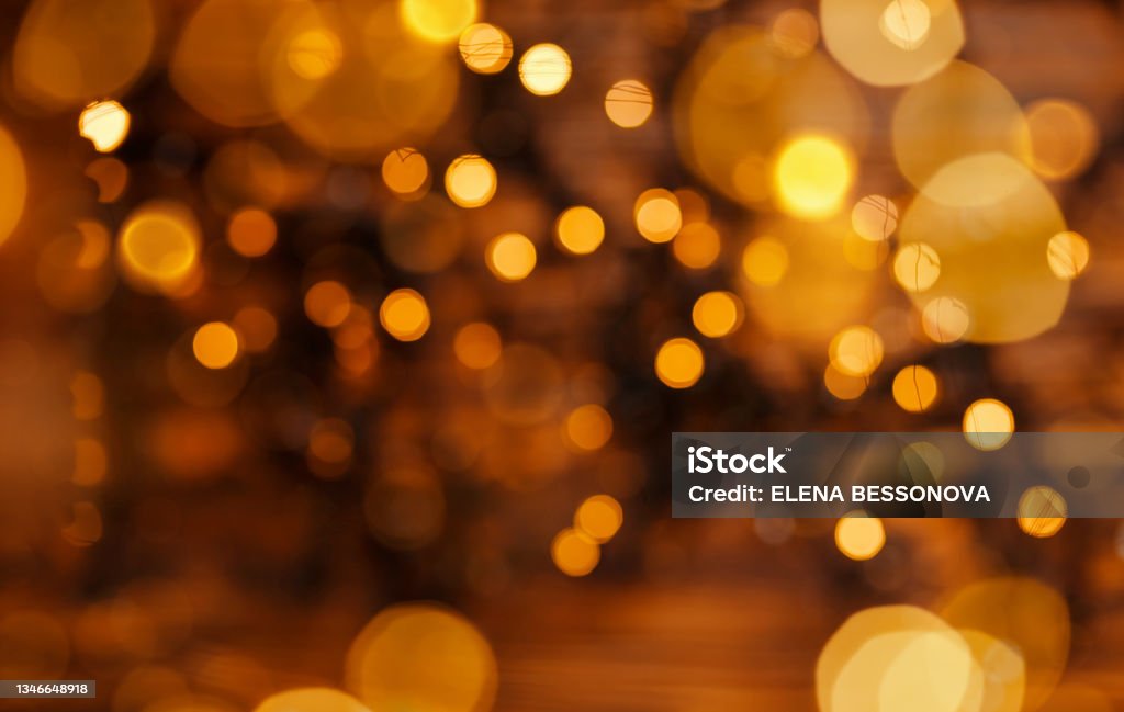 Vintage crystal background texture. Abstract Xmas lights with bokeh. Vintage crystal background texture. Abstract christmas lights with bokeh. Christmas decoration or garland lights bokeh. Lights in yellow golden color. Holiday abstract background, blur defocused. Winter Stock Photo