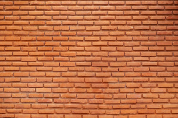 istock front view red brick concrete wall for interior or exterior architecture, backdrop concept. 1346649747