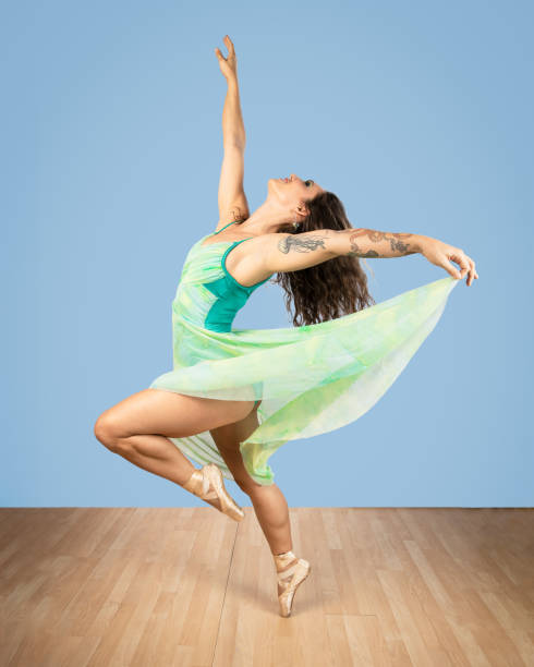 istock Ballet Dancer In Green Dress 1346650493