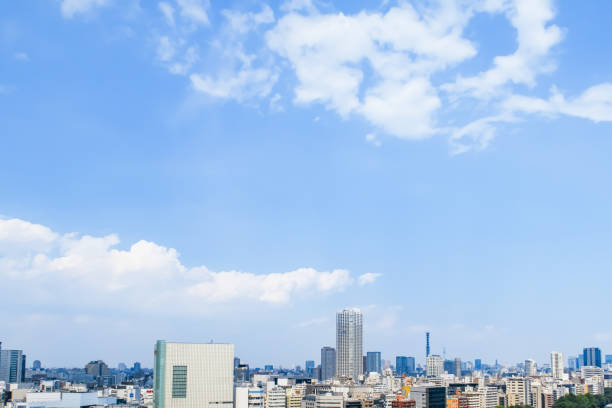 istock Tokyo building street and blue sky 1346651986