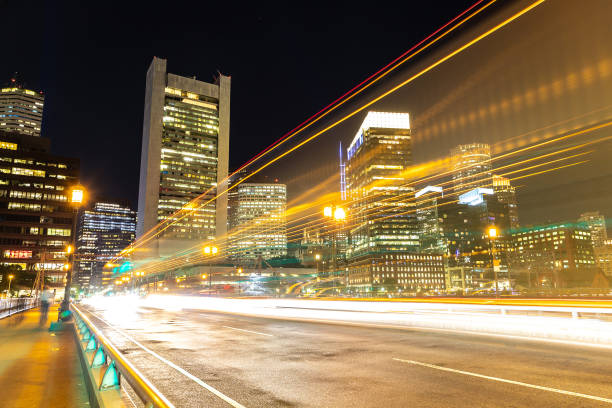 traffic light trails in boston - boston sunset city bridge imagens e fotografias de stock