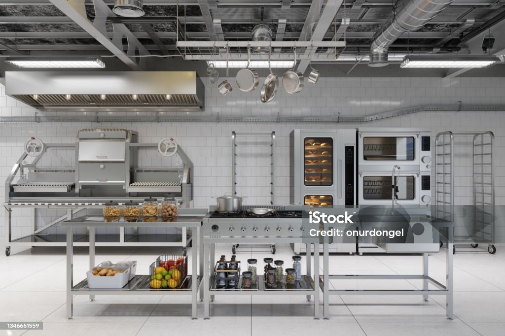 Front View Of Modern Industrial Kitchen Interior With Kitchen Utensils, Equipment And Bakery Products Commercial Kitchen Stock Photo