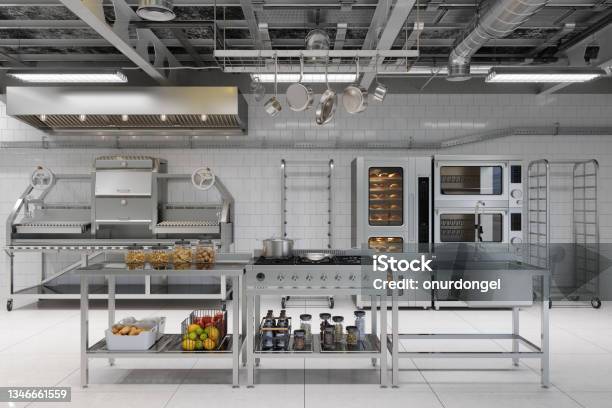 Front View Of Modern Industrial Kitchen Interior With Kitchen Utensils Equipment And Bakery Products Stock Photo - Download Image Now