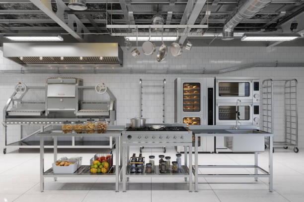 front view of modern industrial kitchen interior with kitchen utensils, equipment and bakery products - restaurant food color image nobody imagens e fotografias de stock