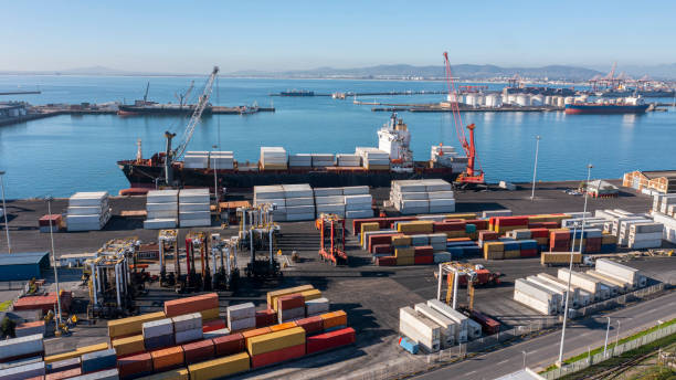 istock High angle shot of cargo being transported by ship in a harbour 1346669360