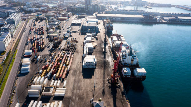istock High angle shot of cargo being transported by ship in a harbour 1346669365