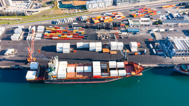 istock High angle shot of cargo being transported by ship in a harbour 1346669366