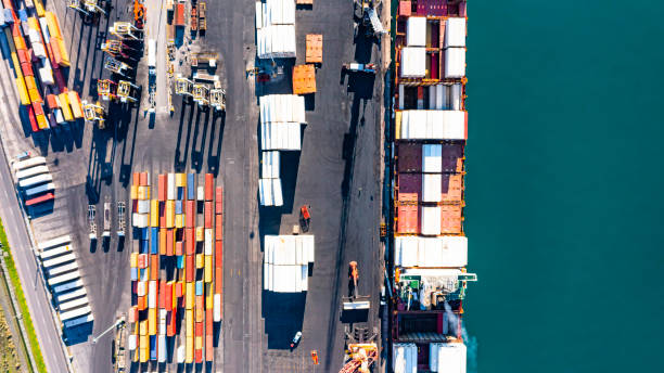 istock High angle shot of cargo being transported by ship in a harbour 1346669370