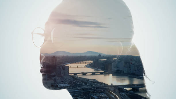 istock Woman silhouette and modern cityscape. Double exposure. 1346671274