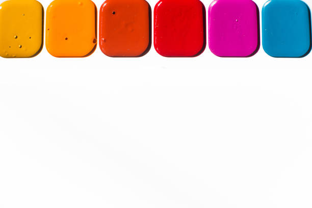 istock Multi-colored bright Watercolor paints close up. A frame from paints on a white background 1346671587