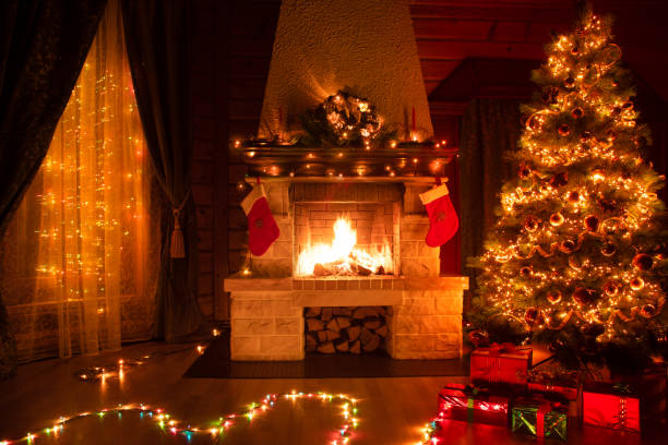 istock Christmas decorated interior with fireplace, window and xmas tree 1346675842