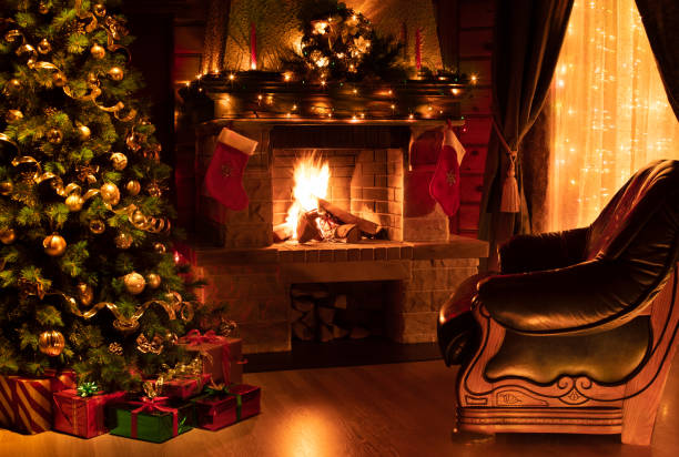 istock Christmas decorated interior with fireplace, armchair, window and tree 1346675844