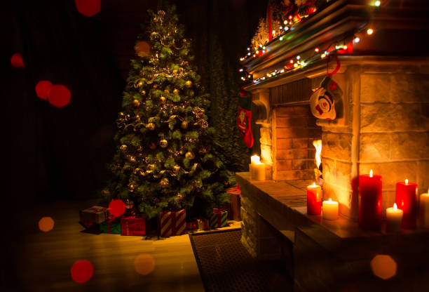 istock Christmas decorated interior with fireplace and xmas tree 1346675874