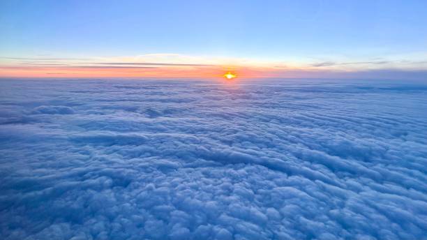 istock View from airplane window to see sky on evening time, sunset 1346676716
