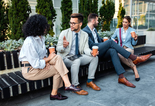 istock Group of coworkers having a coffee brake. 1346676902