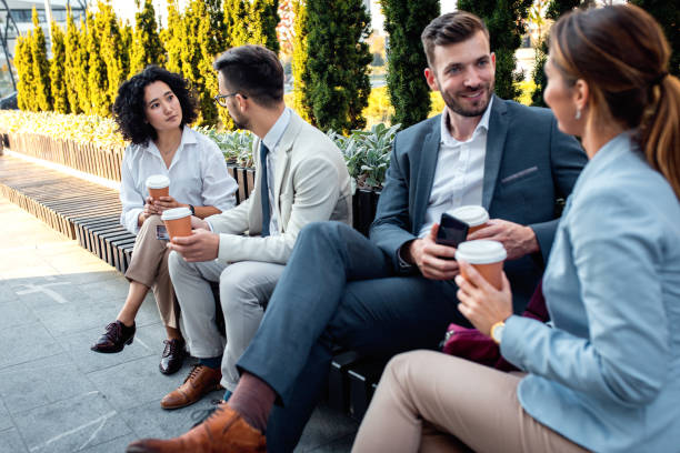 istock Group of coworkers having a coffee brake. 1346676903